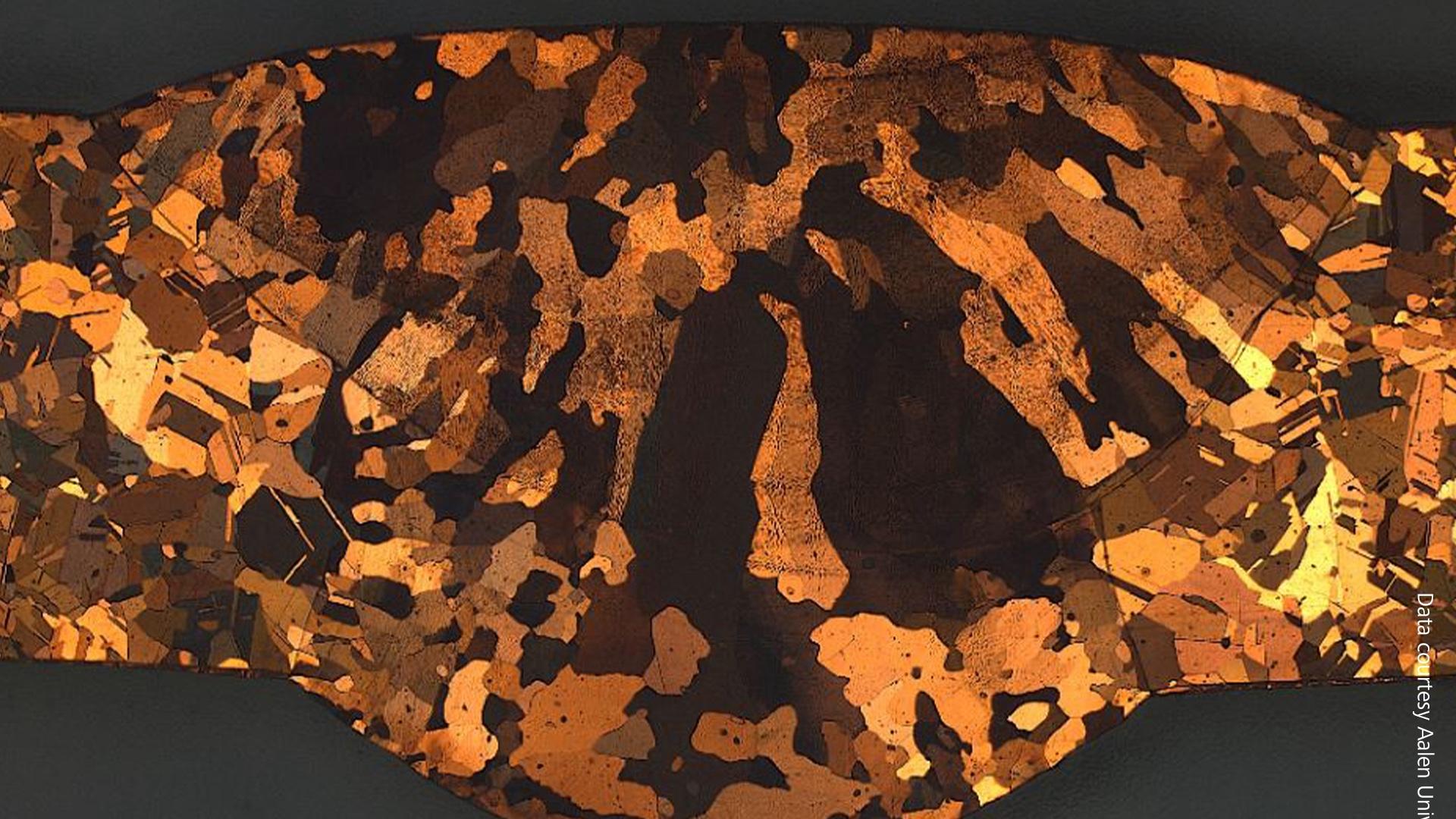 Welded copper connection with visible grains