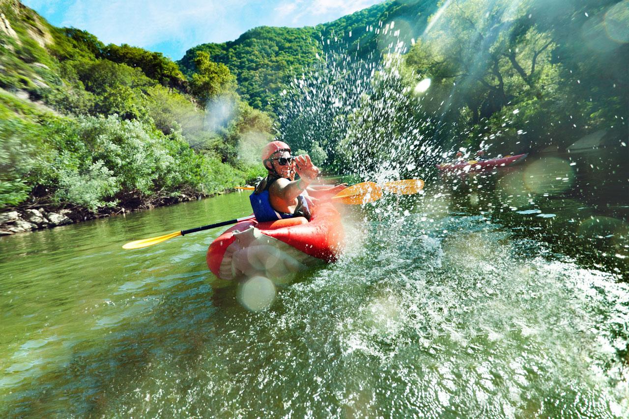 In river canoe splashes